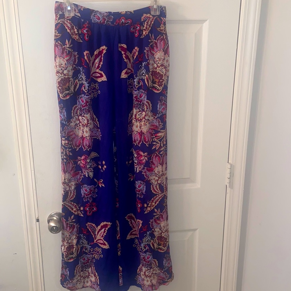 Floral wide- flared leg pants . Size M